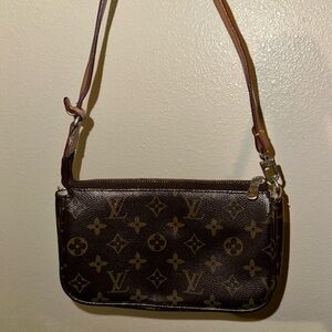 Vintage Louis Vuitton Pochette
Bought in 2010
